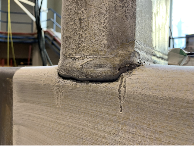 Welding in HSS Corners 8 Figure 6: Full-width X-connection loaded to failure, branches in tension, with rupture in the HSS chord